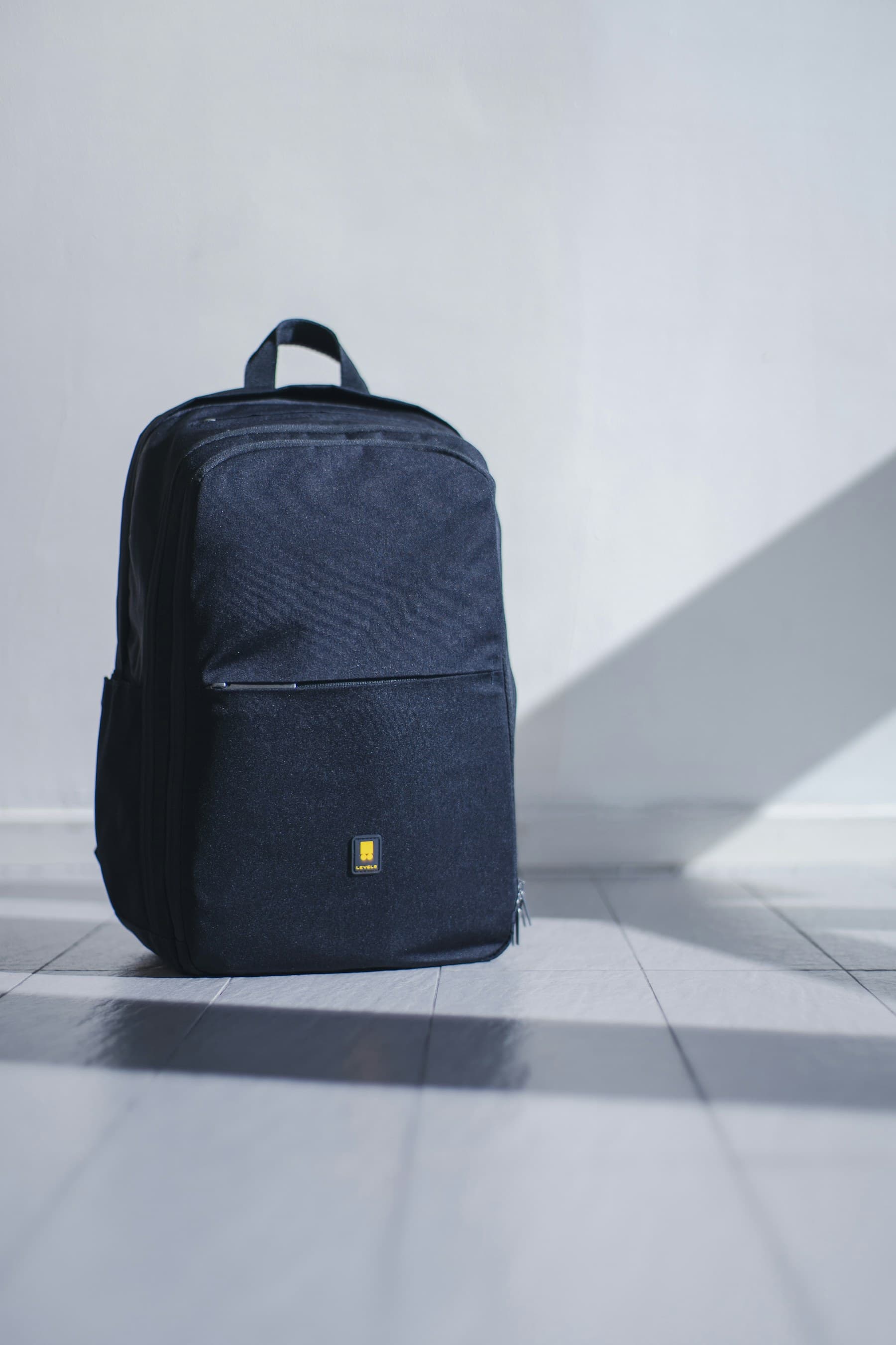 Commuter backpack, navy 22L, photographed by the member