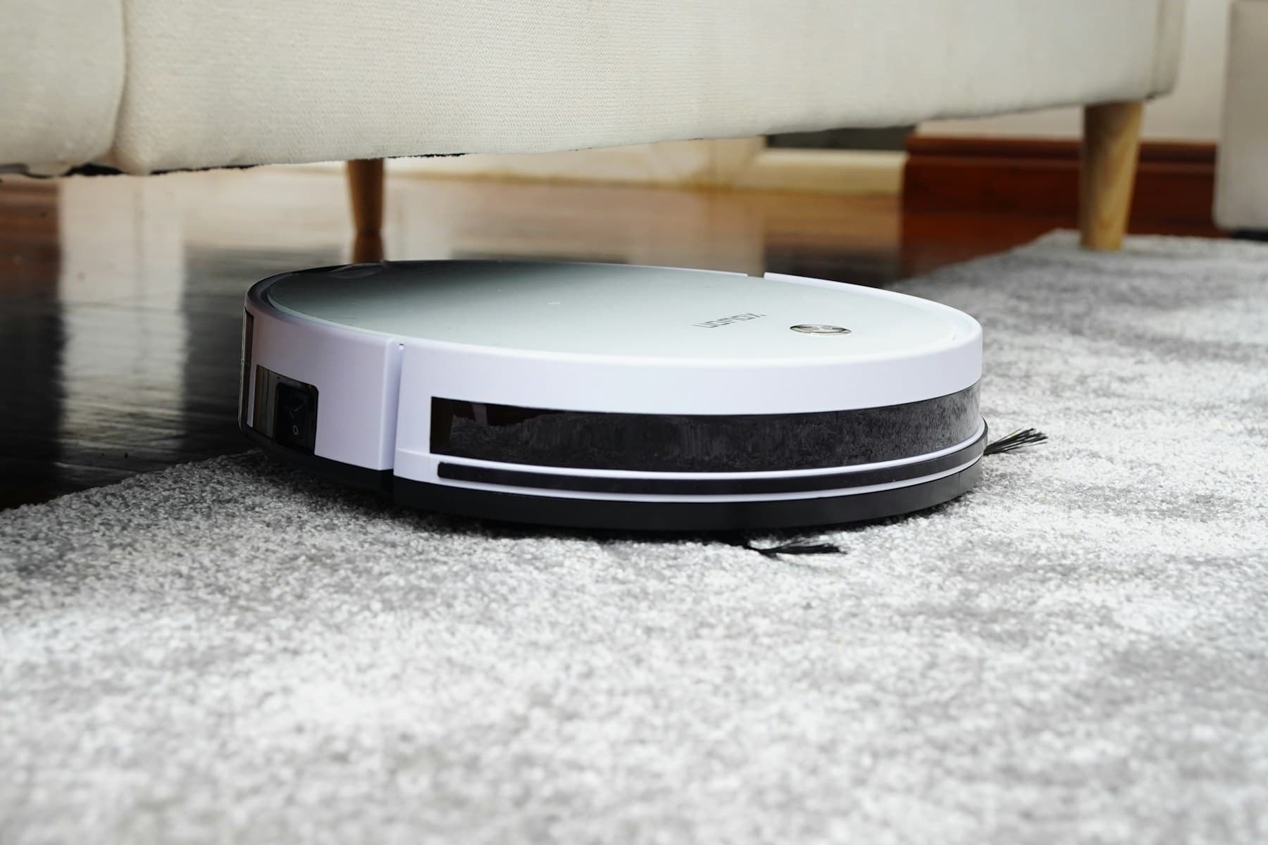 Robot vacuum with dock, photographed by the member
